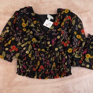 black blouse with floral pattern